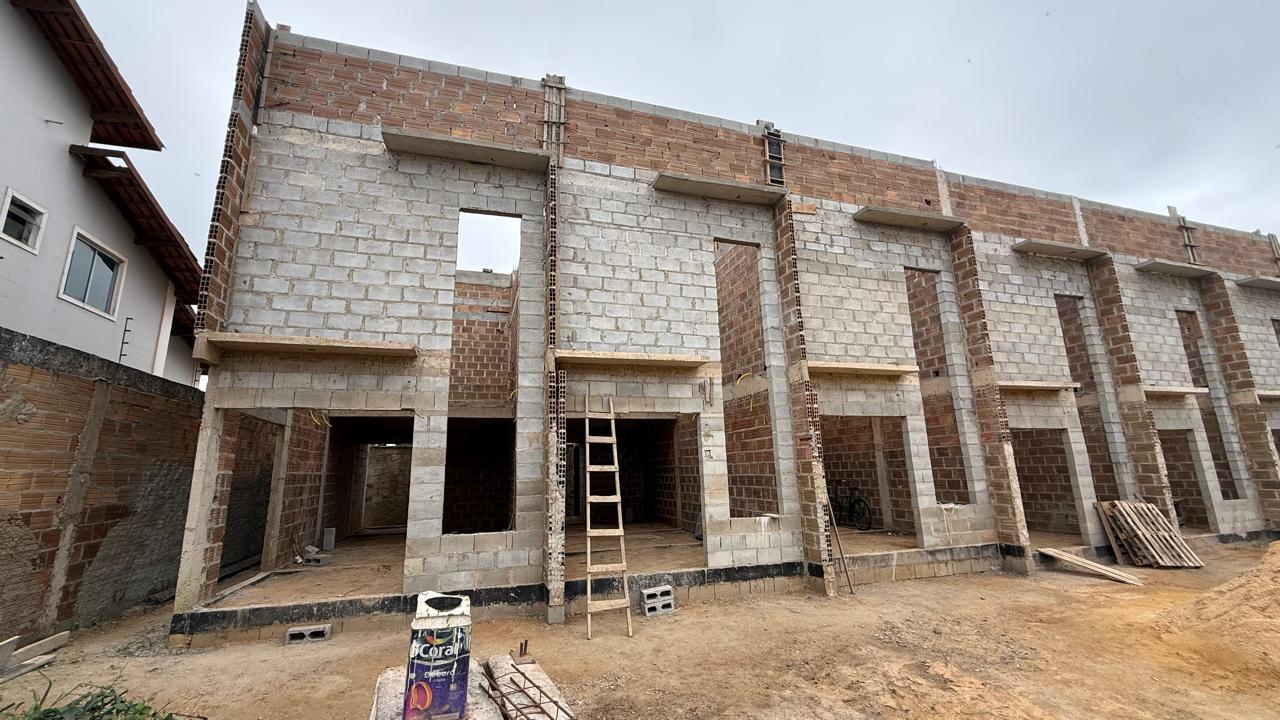 Foto real da obra: Vista lateral do bloco de lofts